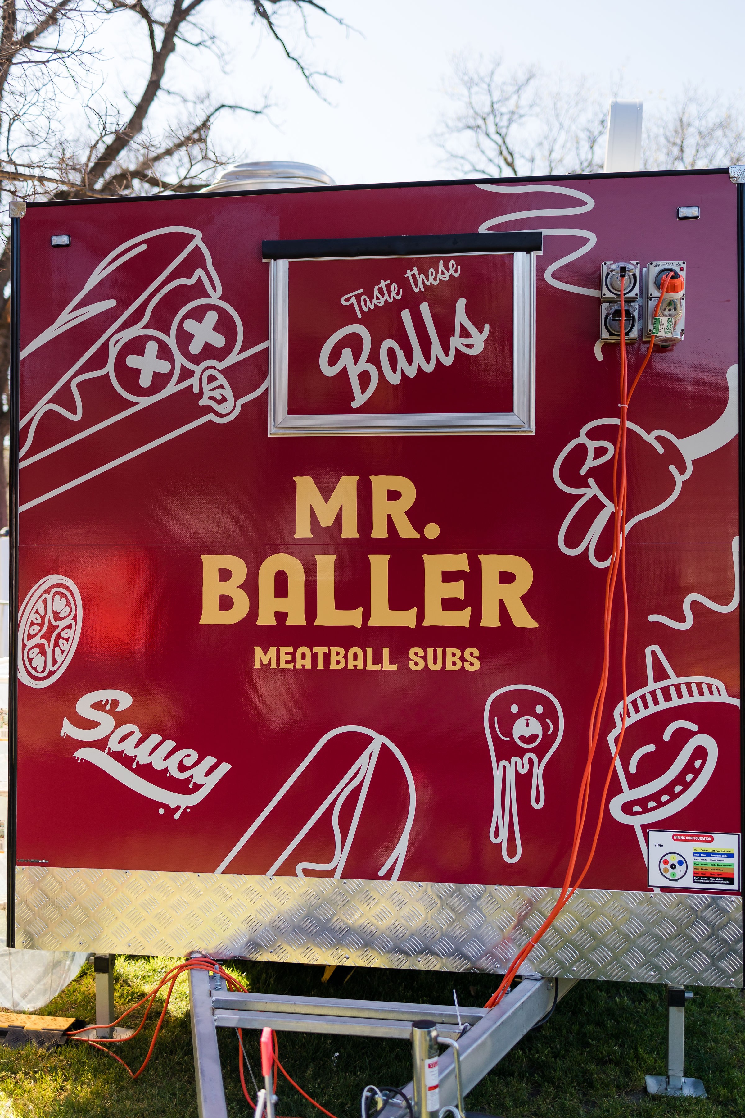 Graphic depicting a hexagonal cropped photo of an interior room design with grid lines along its borders.