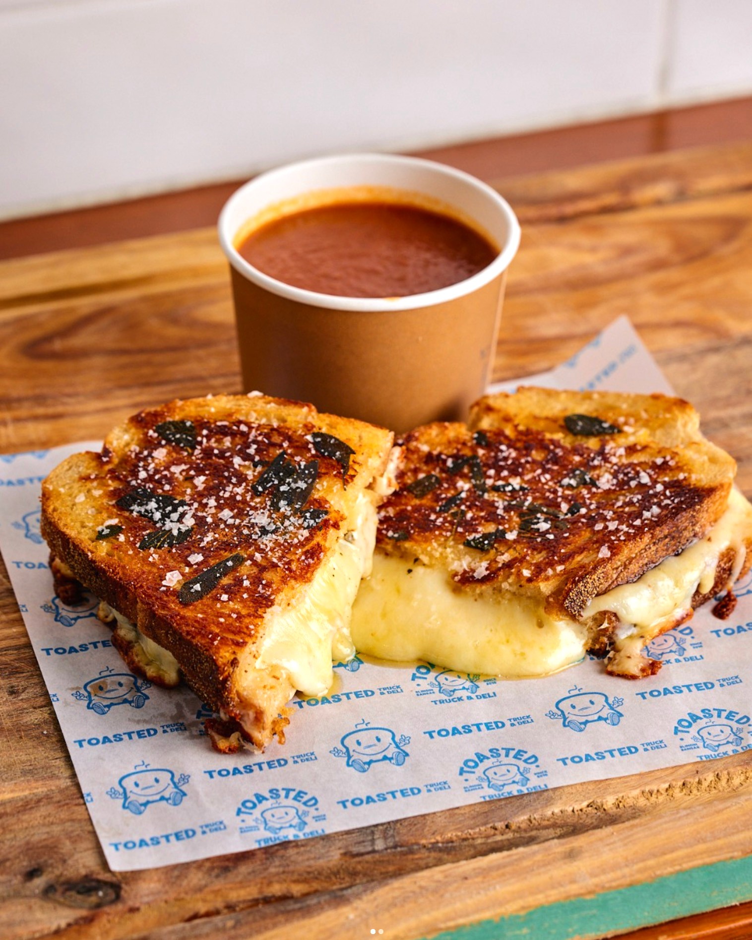 Graphic depicting a hexagonal cropped photo of an interior room design with grid lines along its borders.