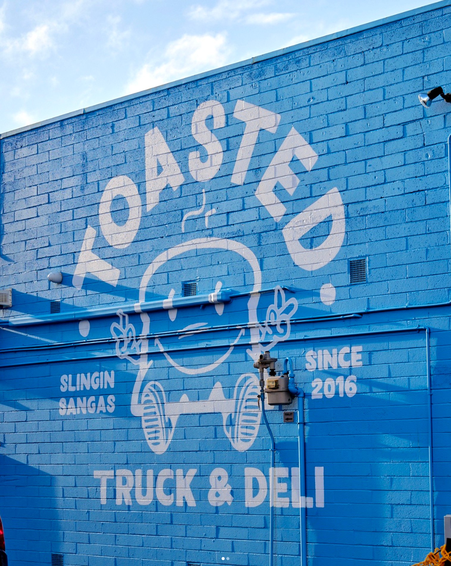 Graphic depicting a hexagonal cropped photo of an interior room design with grid lines along its borders.