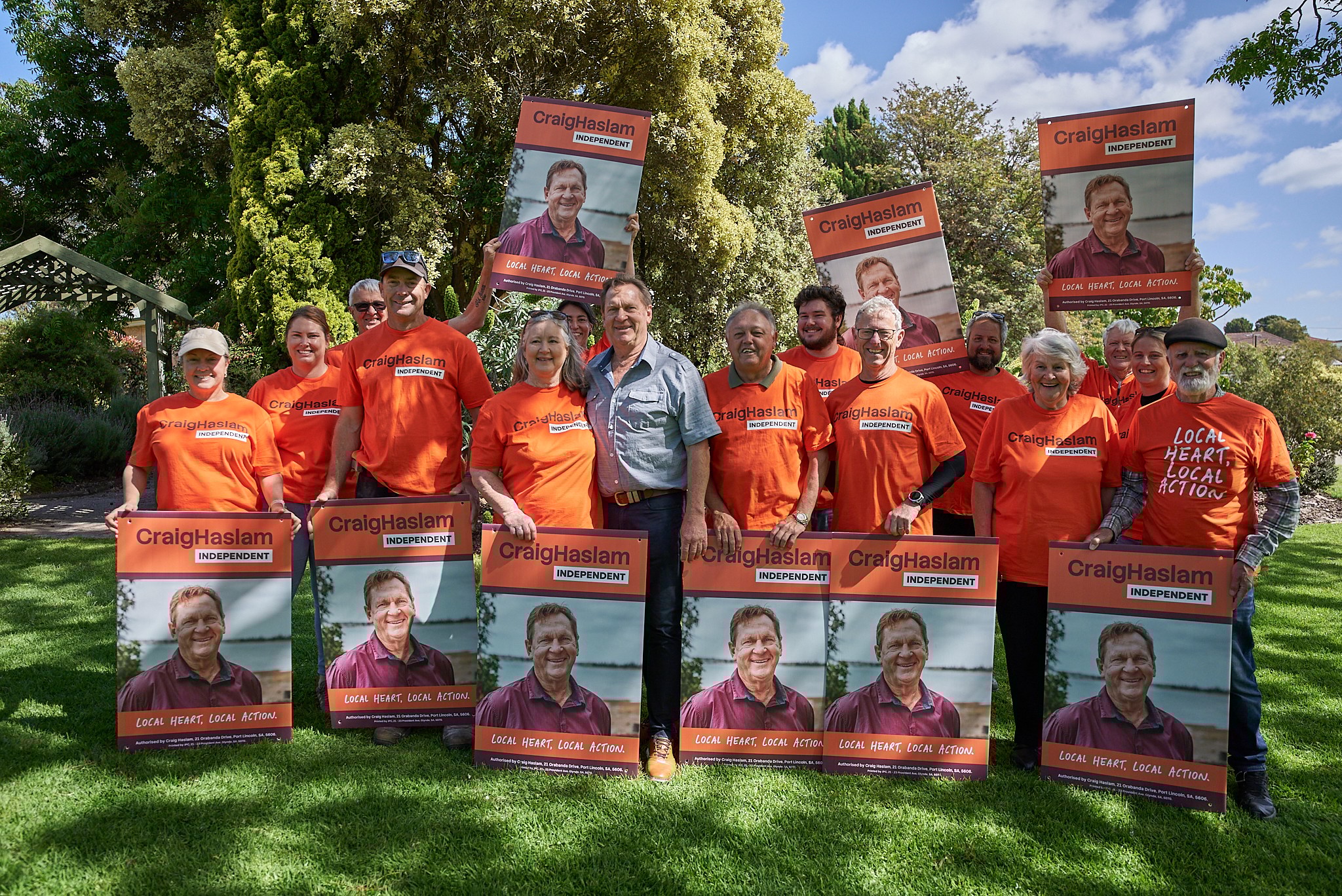 Stylized blue and pink image of a whiskey glass with the wordmark of Vèloce in pink all-caps letters above.